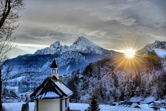 Lockstein Chapel in a winter evening with a view of the Watzmann Lockstein Chapel in a winter evening with a view of the Watzmann