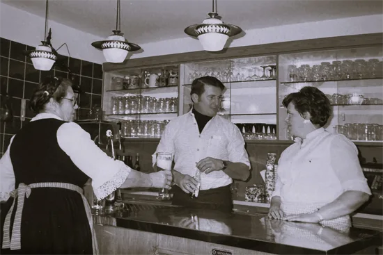 Helmut and Helga, the senior owners, behind the bar.