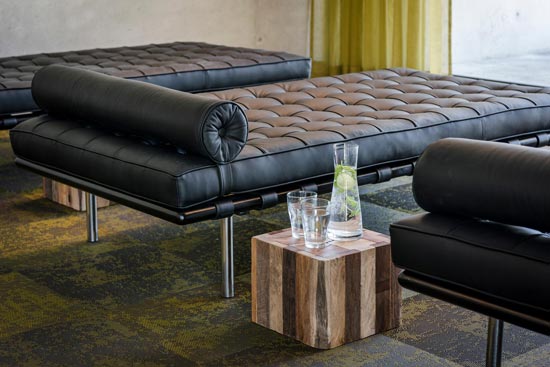 Wellness loungers in the relaxation room with drinks on a wooden peg Wellness loungers in the relaxation room with drinks on a wooden peg